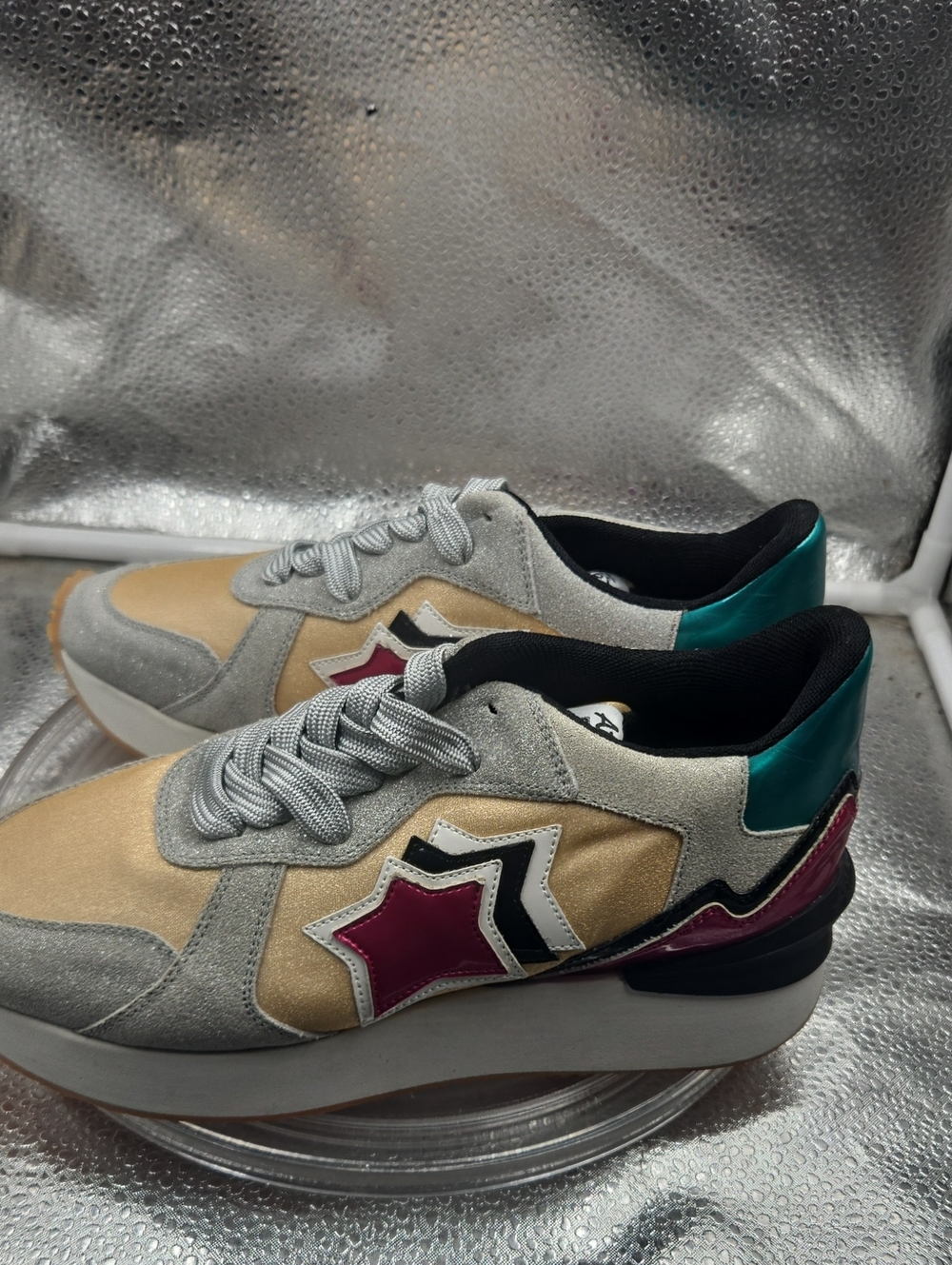 U Silver and gold shoes size 7